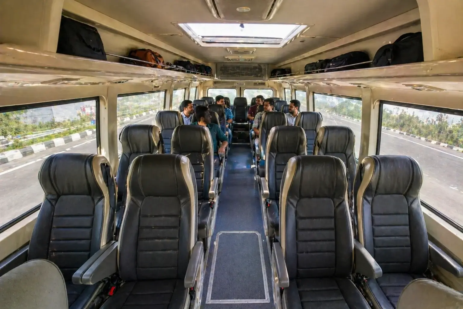 20 seater tempo traveller seating legroom and luggage space