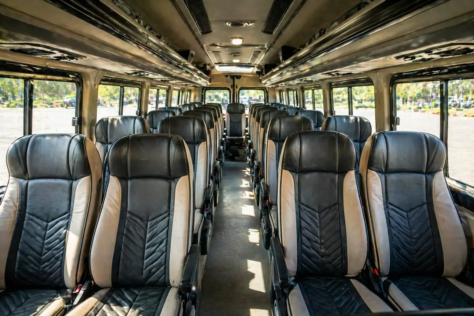 26 seater tempo traveller seating layout with pushback seats and aisle